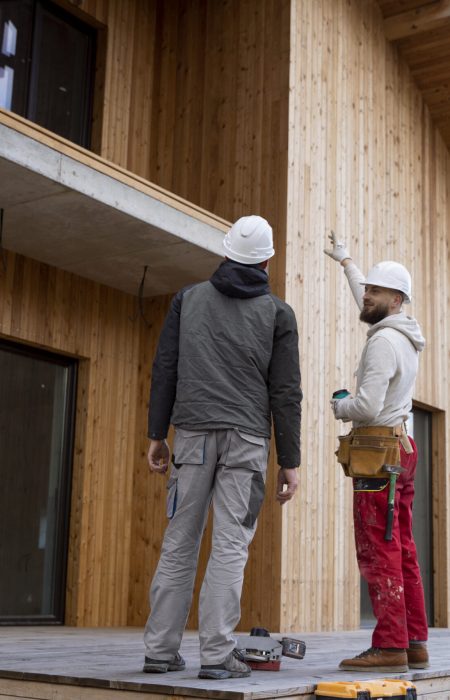 full-shot-construction-men-building-house