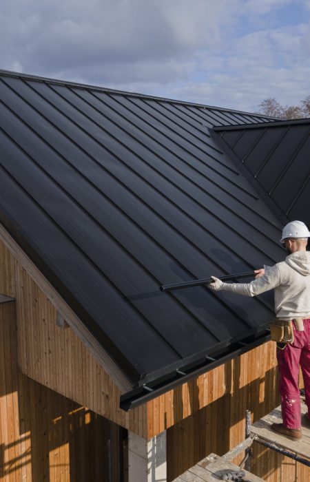full-shot-roofers-working-together-with-helmets