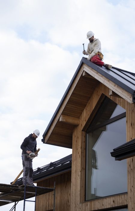 long-shot-men-working-roof (1)